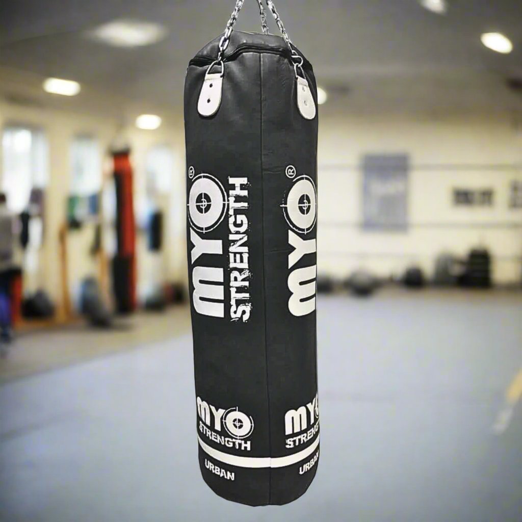Myo Strength Punch Bag - 
 Heavy Duty Straigh 5ft - Leather in black and white in gym setting