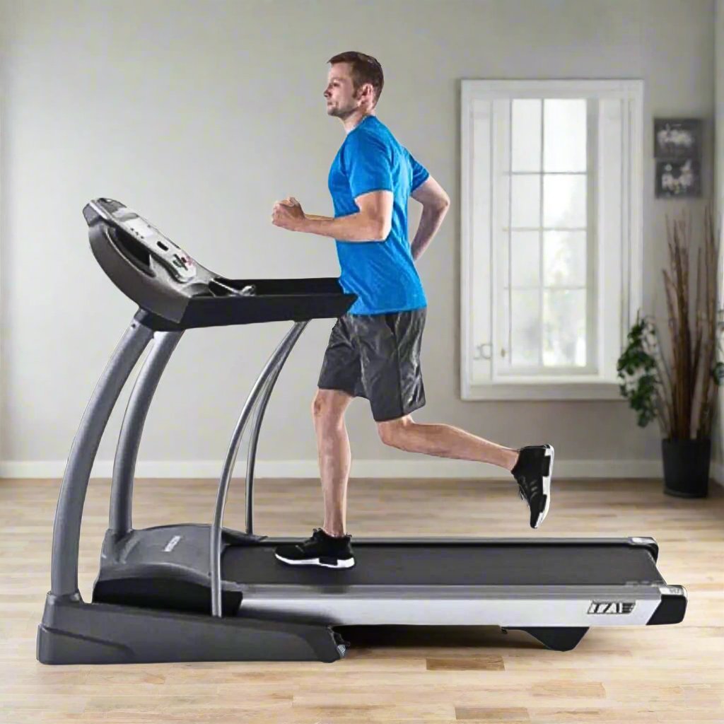 Horizon Fitness Elite T7.1 in grey and black, in a home gym setting