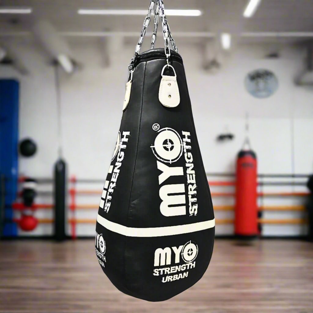 Myo Strength Punch Bag-UpperCut 3.5ft Leather - black and white in a gym setting