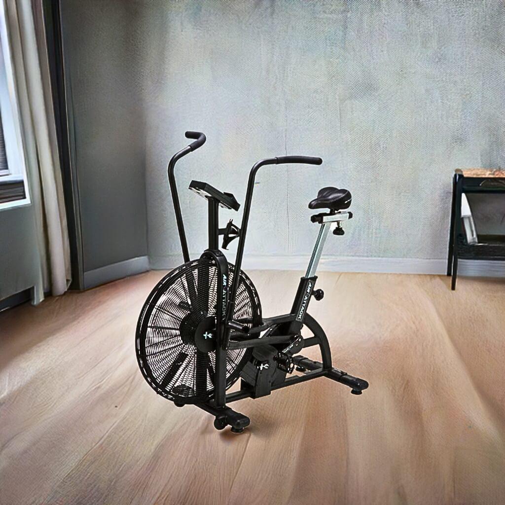 The Air Attack Bike in black in a spare room. Showing it is easy to move and convenient to use anywhere at home.