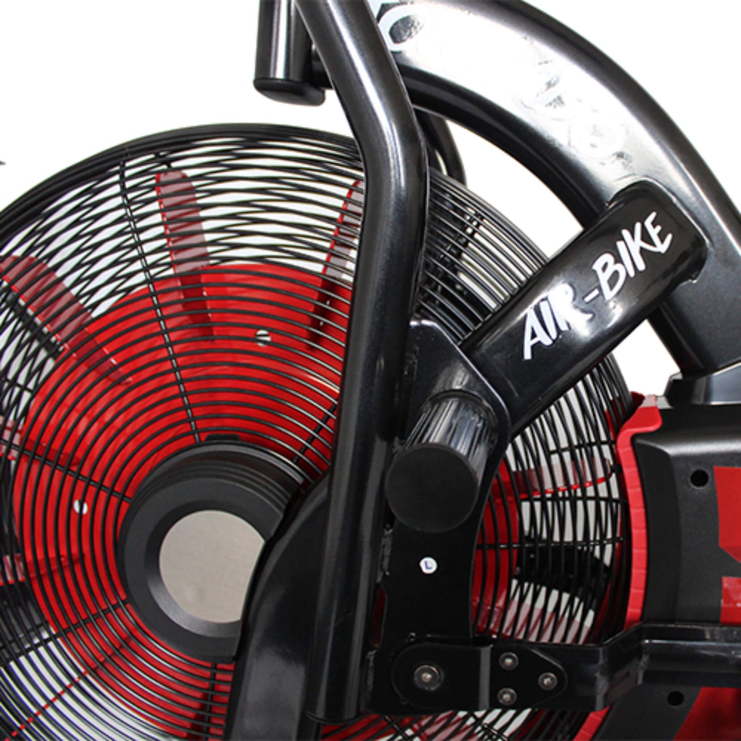 Tornado Air Bike showing a close view of the fan wheel in red with a black guard around it for safety.